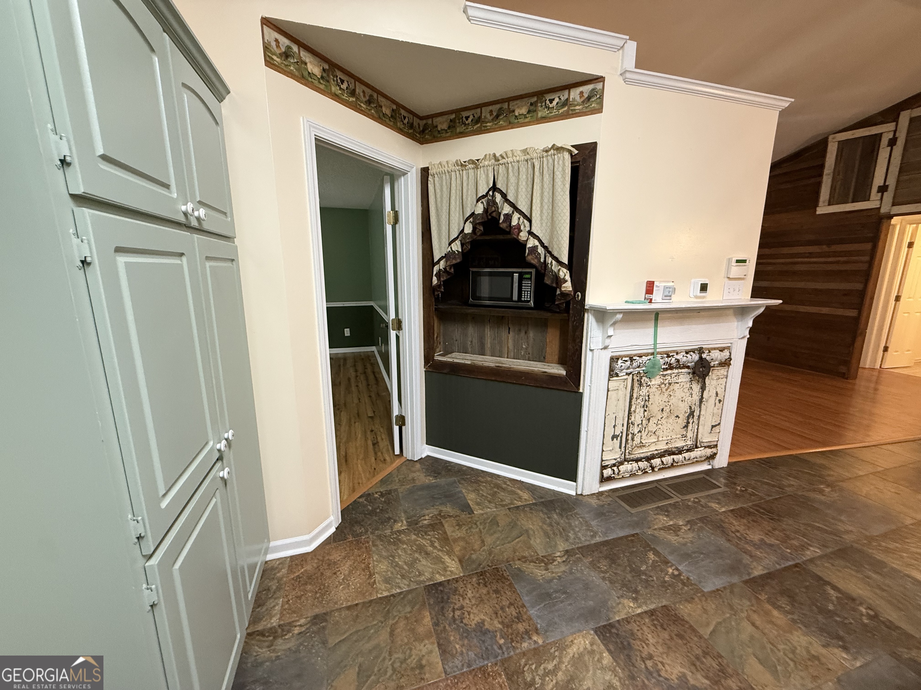 308 Deer Run Williamson, GA 30292 - Photo 18 of 35 a view of a hallway and an outdoor space