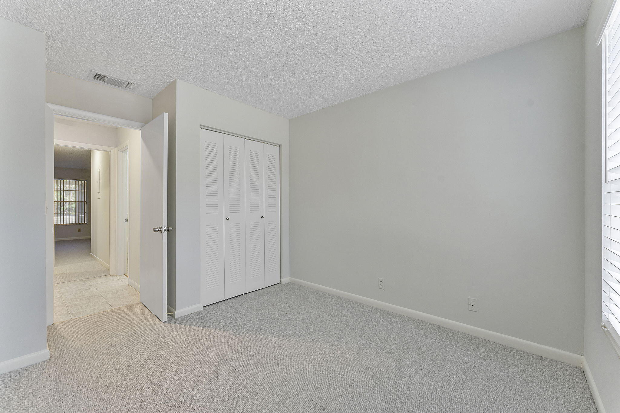 115 Oakwood Drive Jupiter, FL 33458 - Photo 12 of 21 a view of an empty room