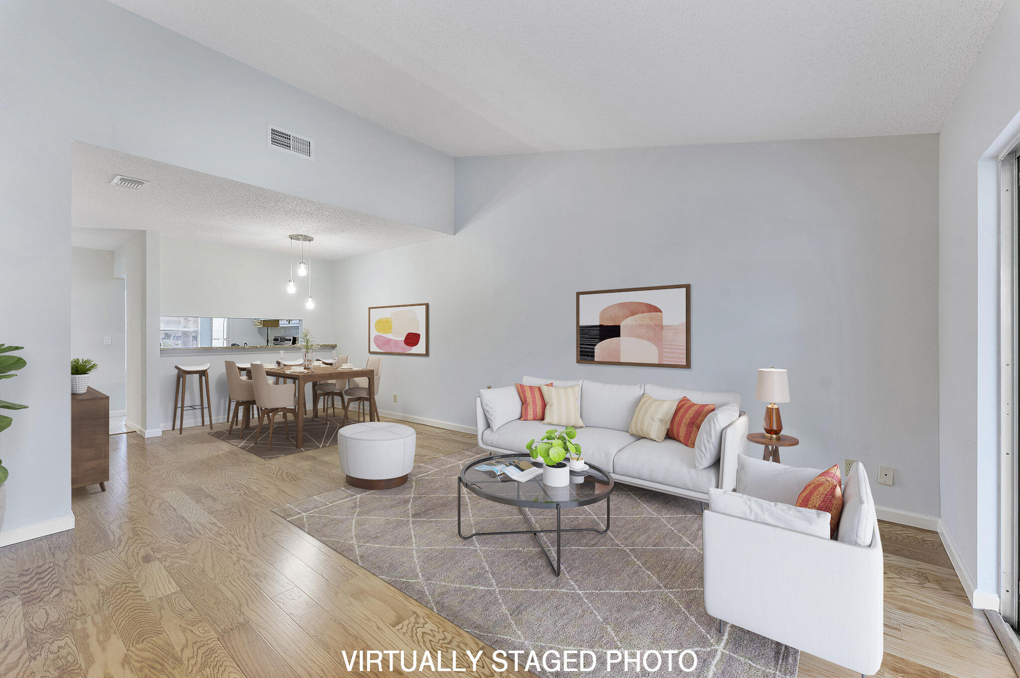 115 Oakwood Drive Jupiter, FL 33458 - Photo 5 of 21 a living room with furniture and a wooden floor