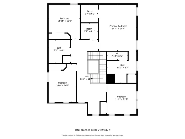 a picture of a rug with a white wall and a picture