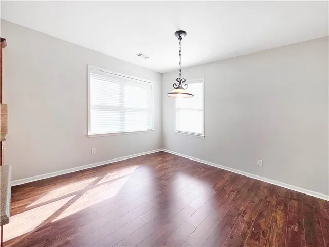 an empty room that has a window