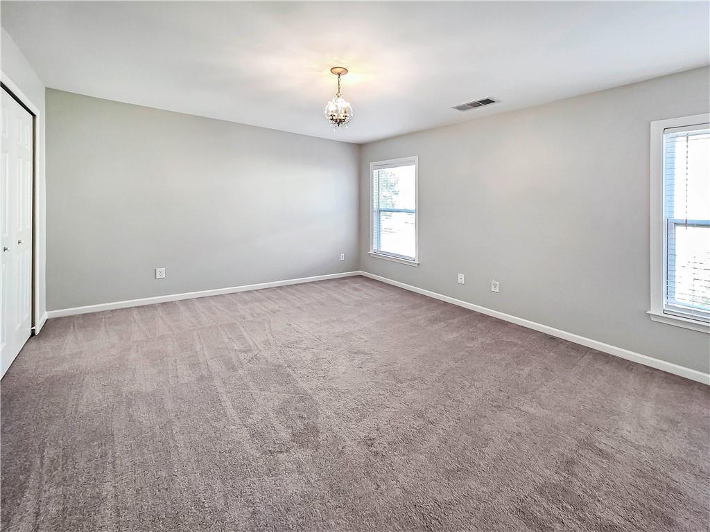 5425 Fieldfreen Drive Cumming, GA 30028 - Photo 45 of 51 a view of an empty room with a window