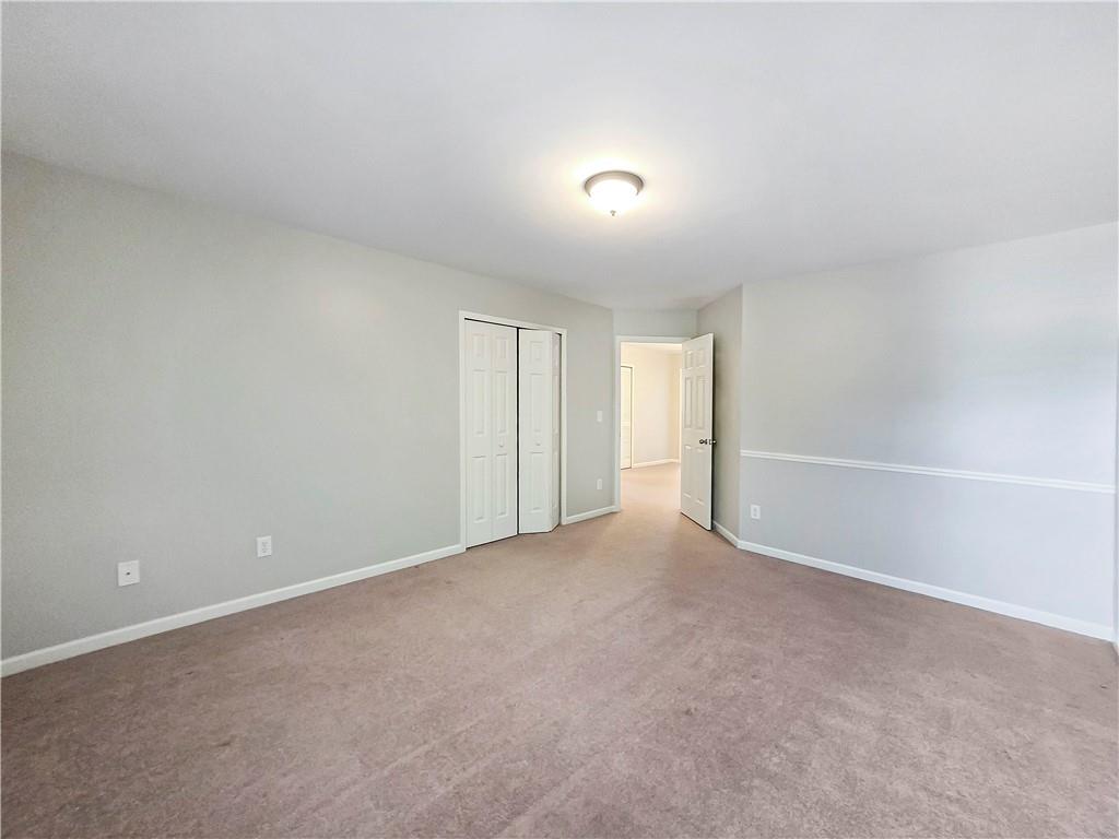 5425 Fieldfreen Drive Cumming, GA 30028 - Photo 46 of 51 a view of an empty room with a window