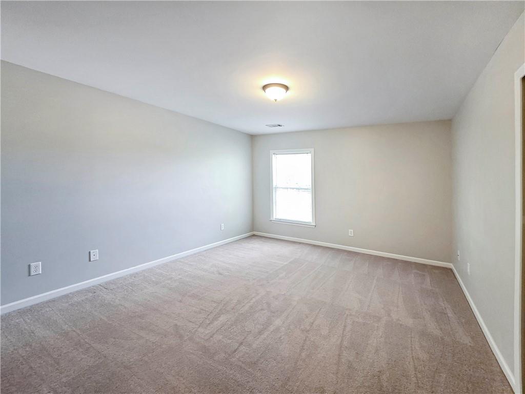 5425 Fieldfreen Drive Cumming, GA 30028 - Photo 47 of 51 a view of an empty room with a window