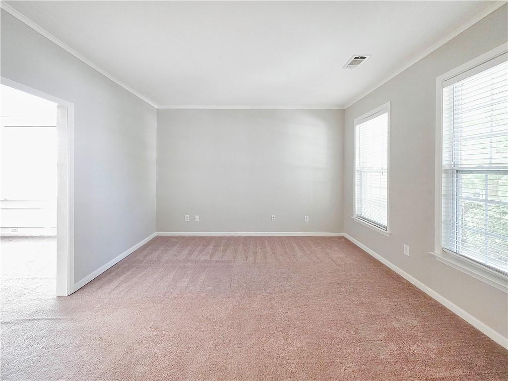 5425 Fieldfreen Drive Cumming, GA 30028 - Photo 7 of 51 an empty room with windows