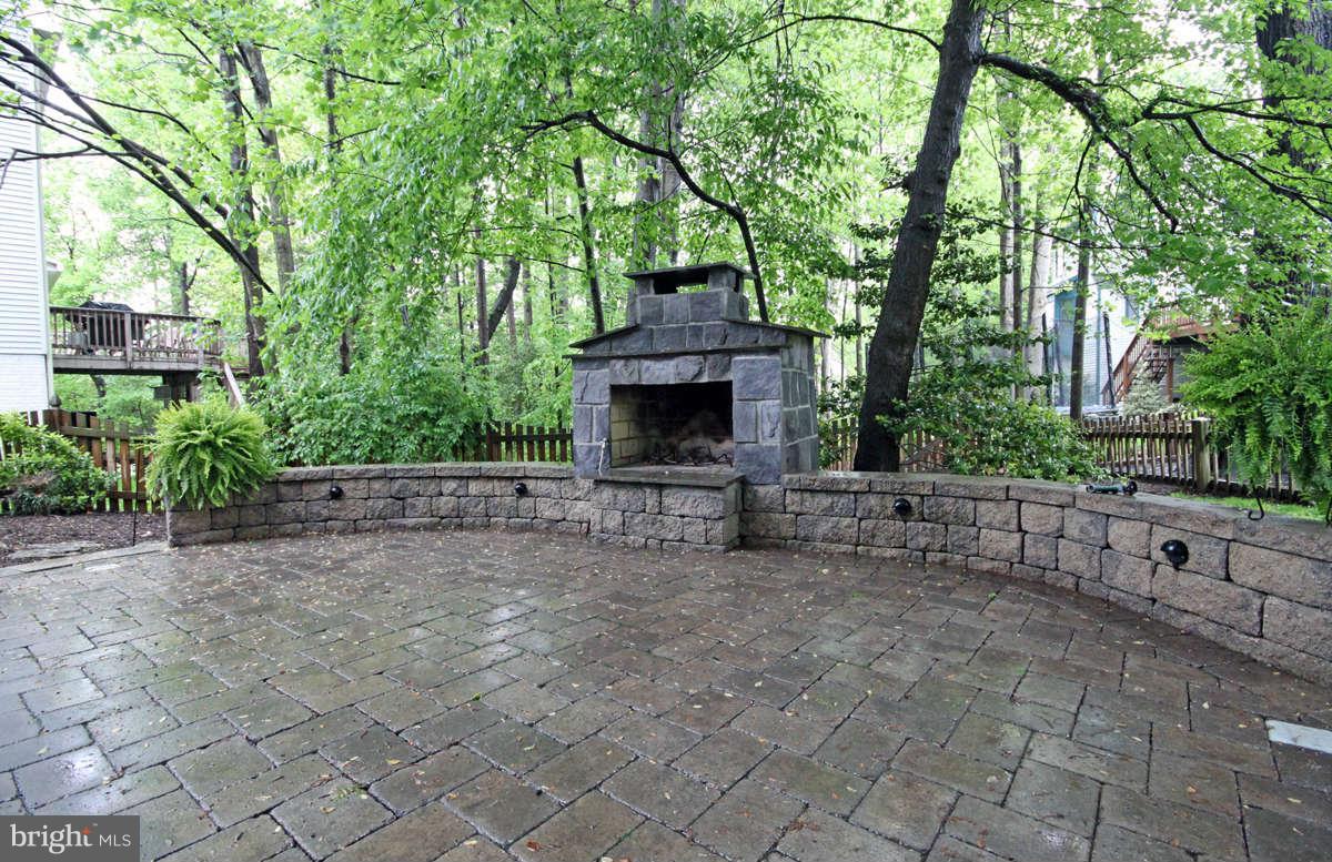 9801 Cresence Way Fairfax, VA 22032 - Photo 29 of 30 a view of house with outdoor space and sitting area