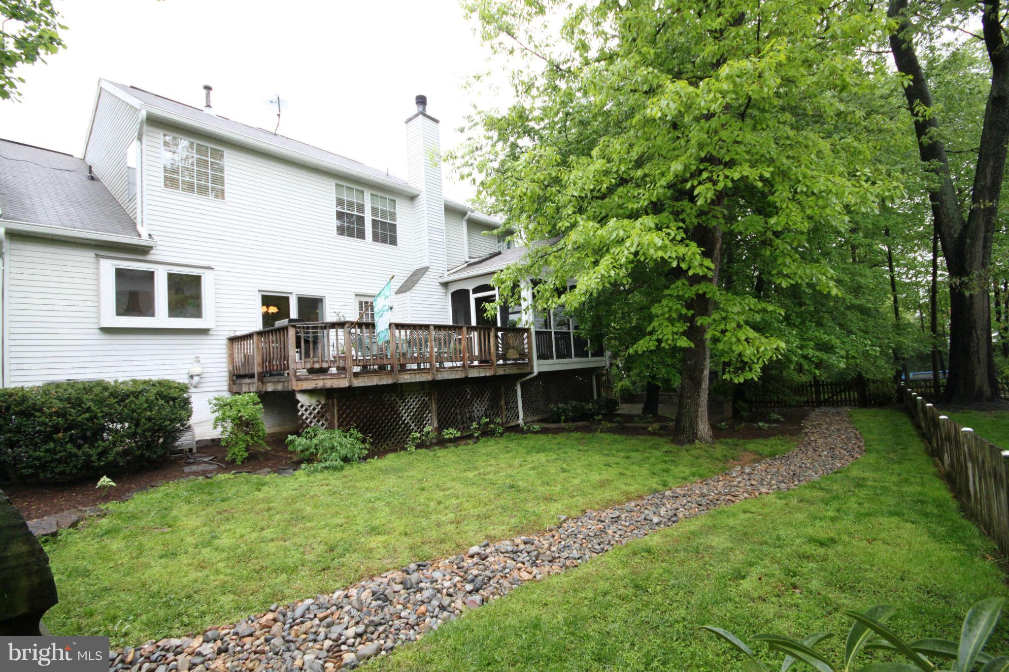 9801 Cresence Way Fairfax, VA 22032 - Photo 30 of 30 a view of house with backyard and pool