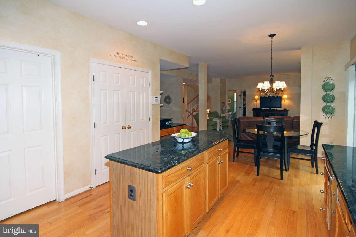 9801 Cresence Way Fairfax, VA 22032 - Photo 10 of 30 a very nice looking dining room with a table and chairs