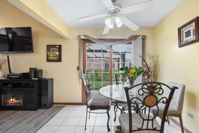 a view of a livingroom with furniture and a flat screen tv