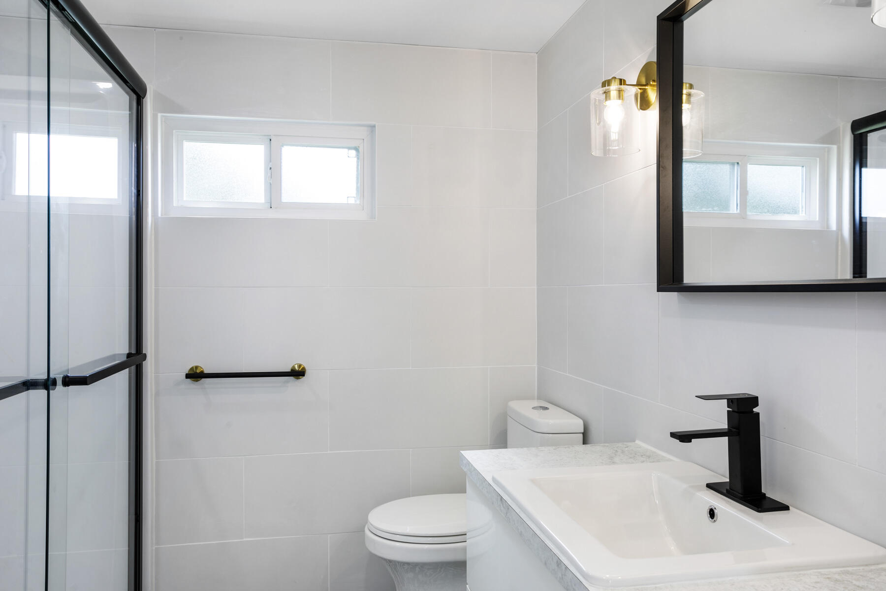 3003 Bimini Bay Boynton Beach, FL 33436 - Photo 13 of 31 a bathroom with a sink toilet and mirror