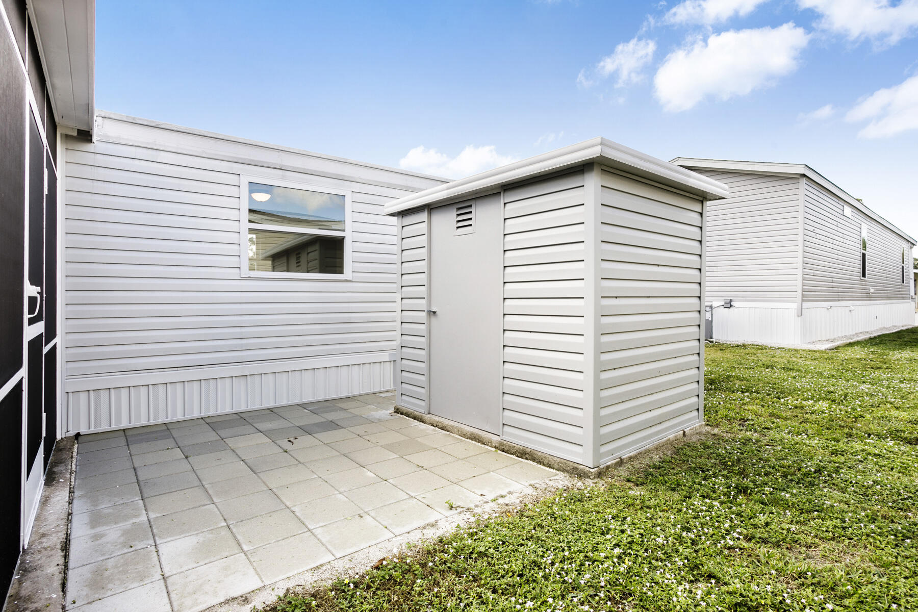 3003 Bimini Bay Boynton Beach, FL 33436 - Photo 17 of 31 a view of a house with a backyard