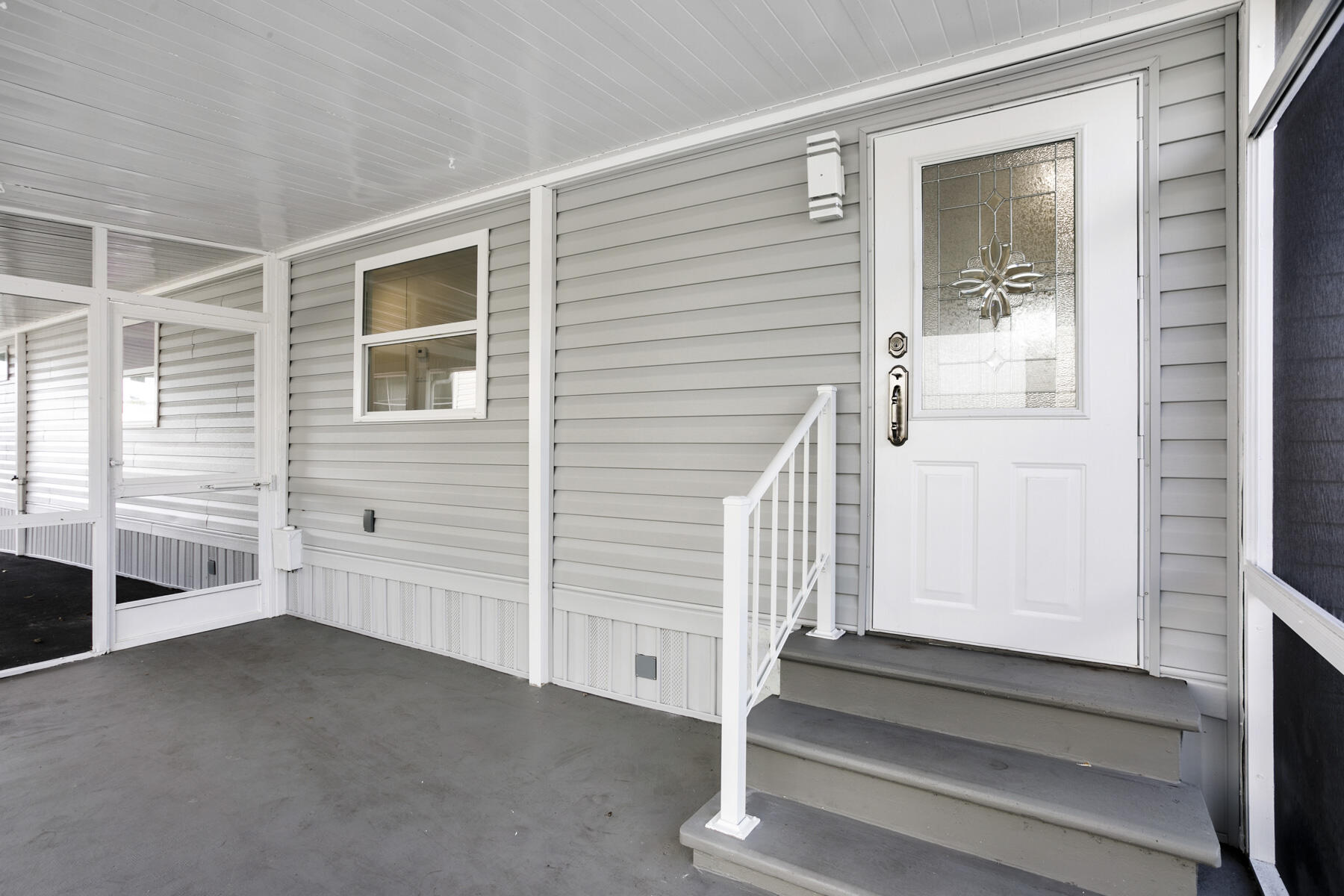 3003 Bimini Bay Boynton Beach, FL 33436 - Photo 19 of 31 a view of entryway with wooden floor and stairs