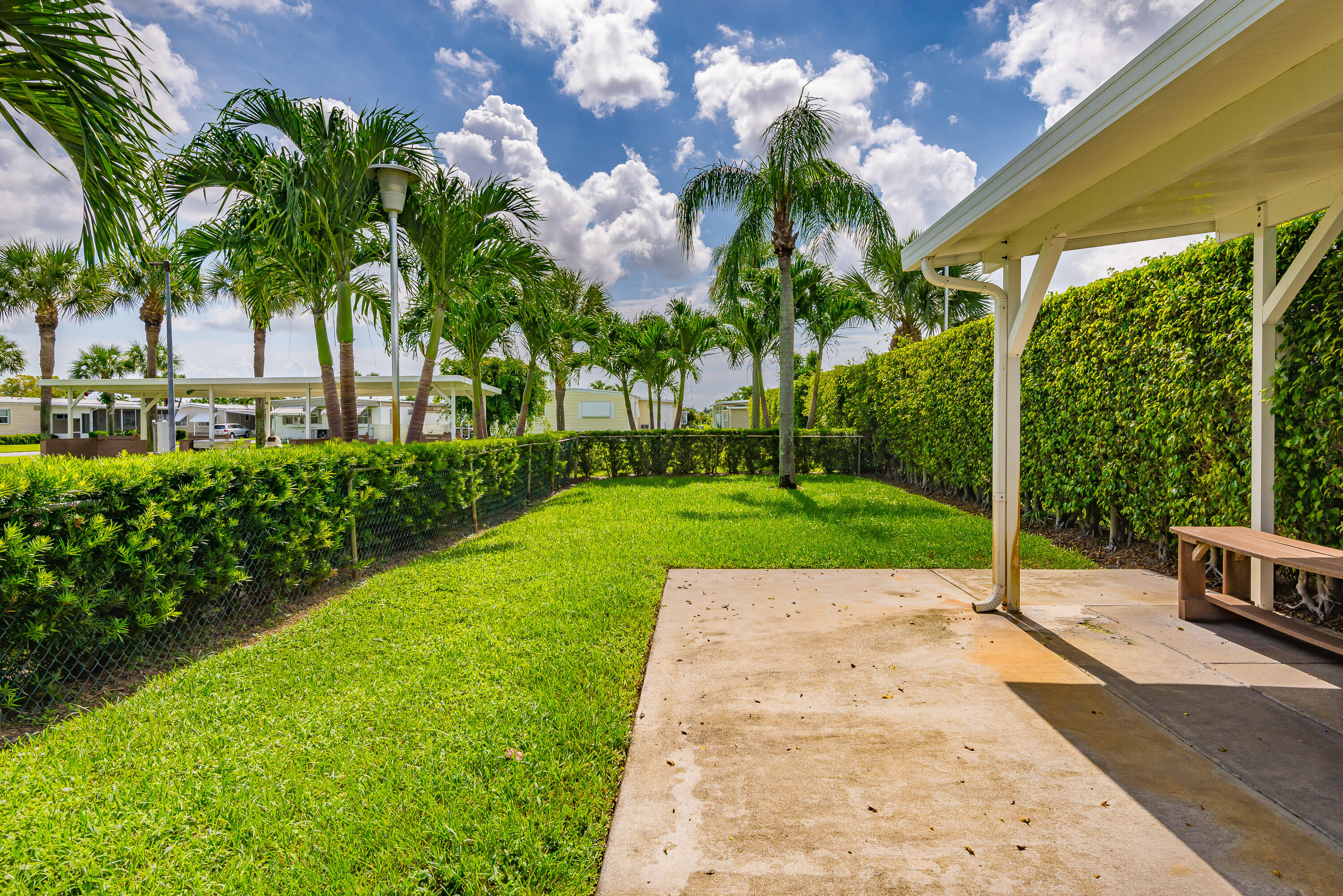 3003 Bimini Bay Boynton Beach, FL 33436 - Photo 29 of 31 a view of a backyard with palm tree