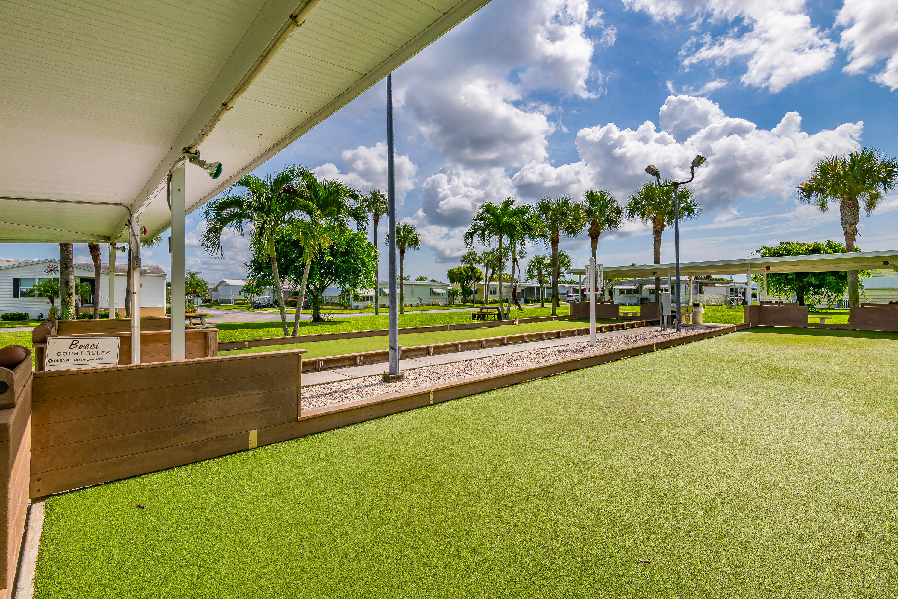 3003 Bimini Bay Boynton Beach, FL 33436 - Photo 30 of 31 a view of a swimming pool with an outdoor seating