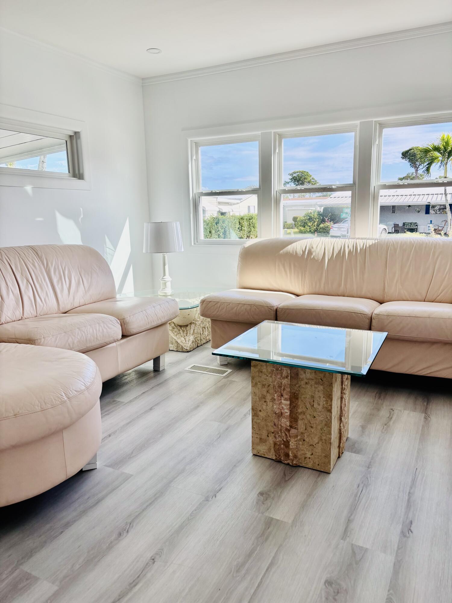 3003 Bimini Bay Boynton Beach, FL 33436 - Photo 7 of 31 a living room with furniture and a wooden floor