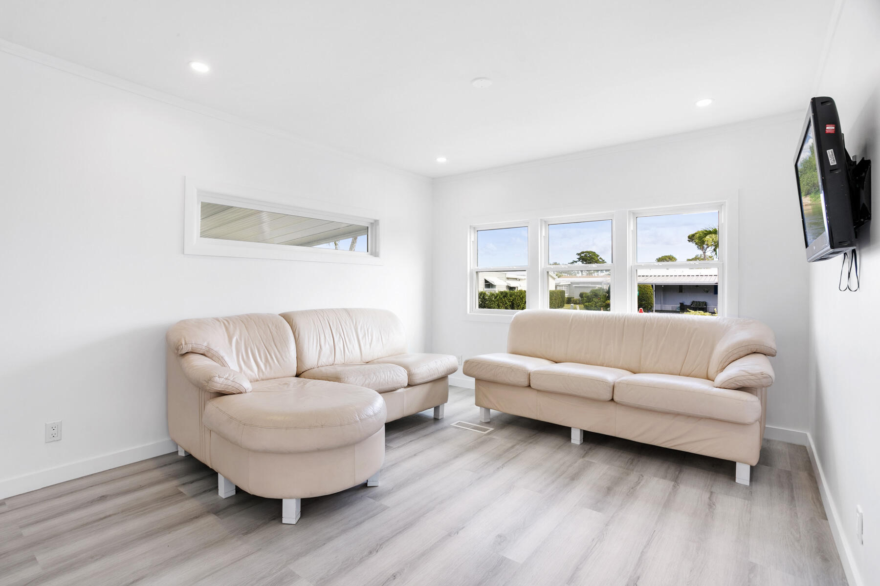3003 Bimini Bay Boynton Beach, FL 33436 - Photo 9 of 31 a living room with furniture and a flat screen tv