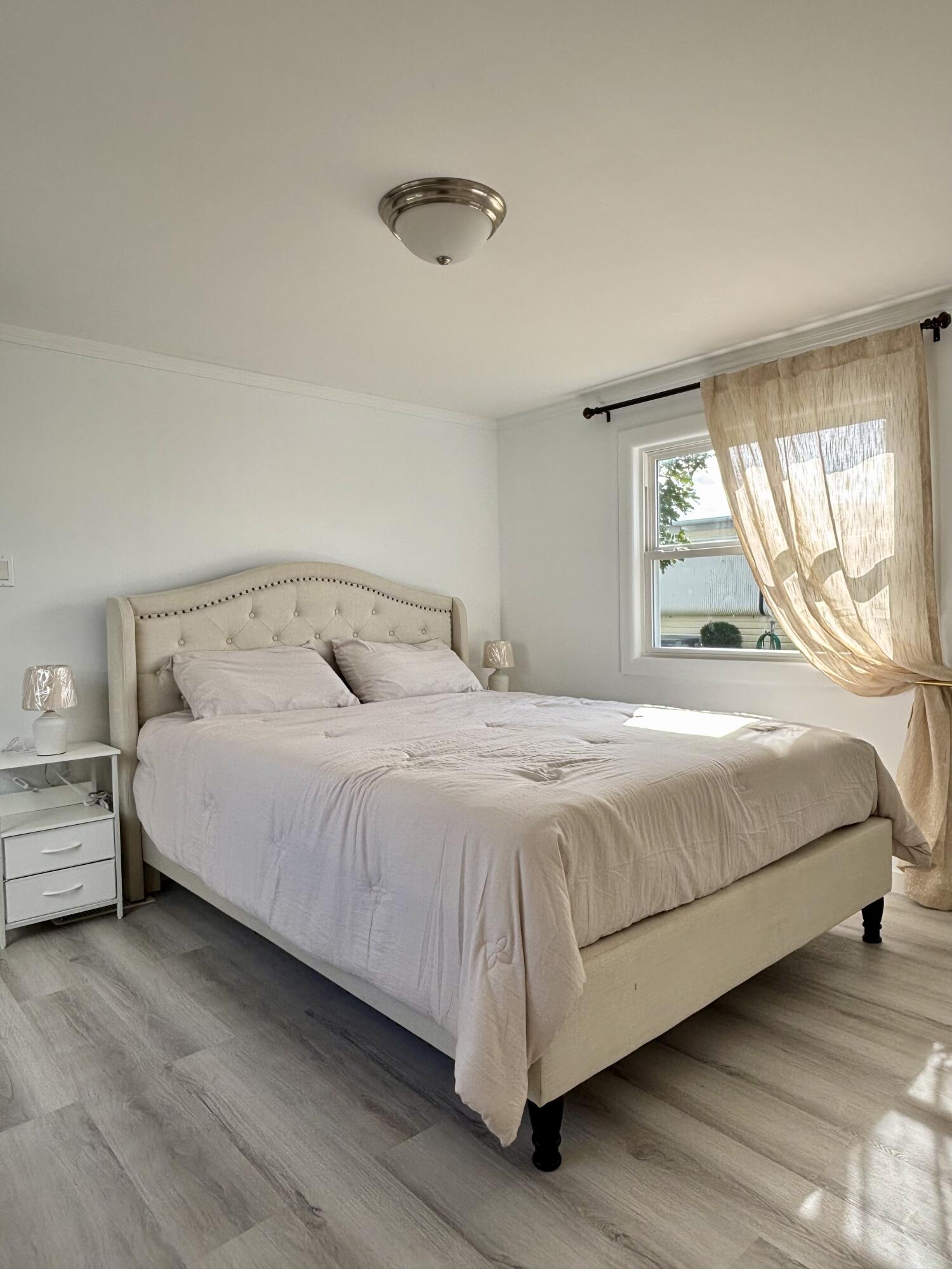 3003 Bimini Bay Boynton Beach, FL 33436 - Photo 10 of 31 a bedroom with a bed and window