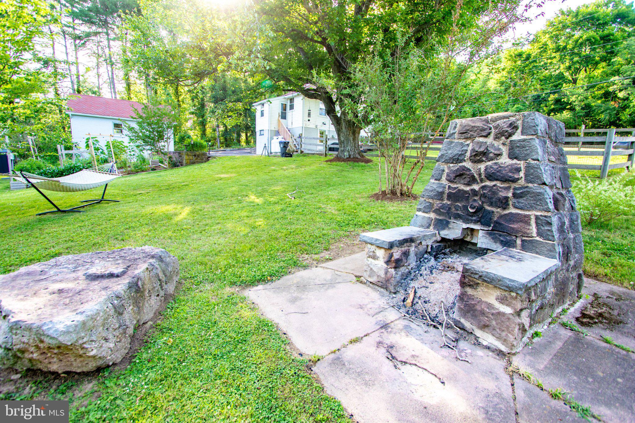 2056 Ridge Road Elverson, PA 19520 - Photo 79 of 89 Charming outdoor retreat with fire pit.