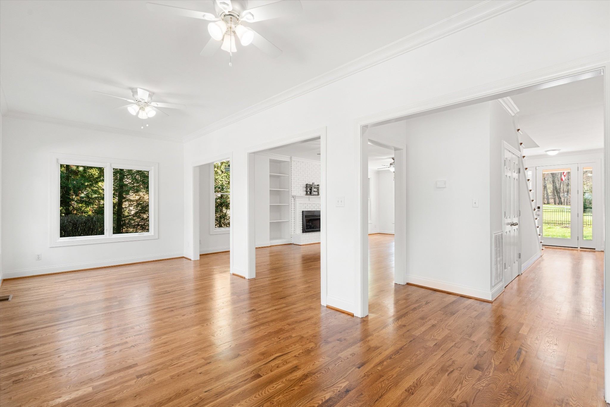 3863 Saundersville Ferry Road Mount Juliet, TN 37122 - Photo 18 of 83 a view of an empty room with wooden floor and a window