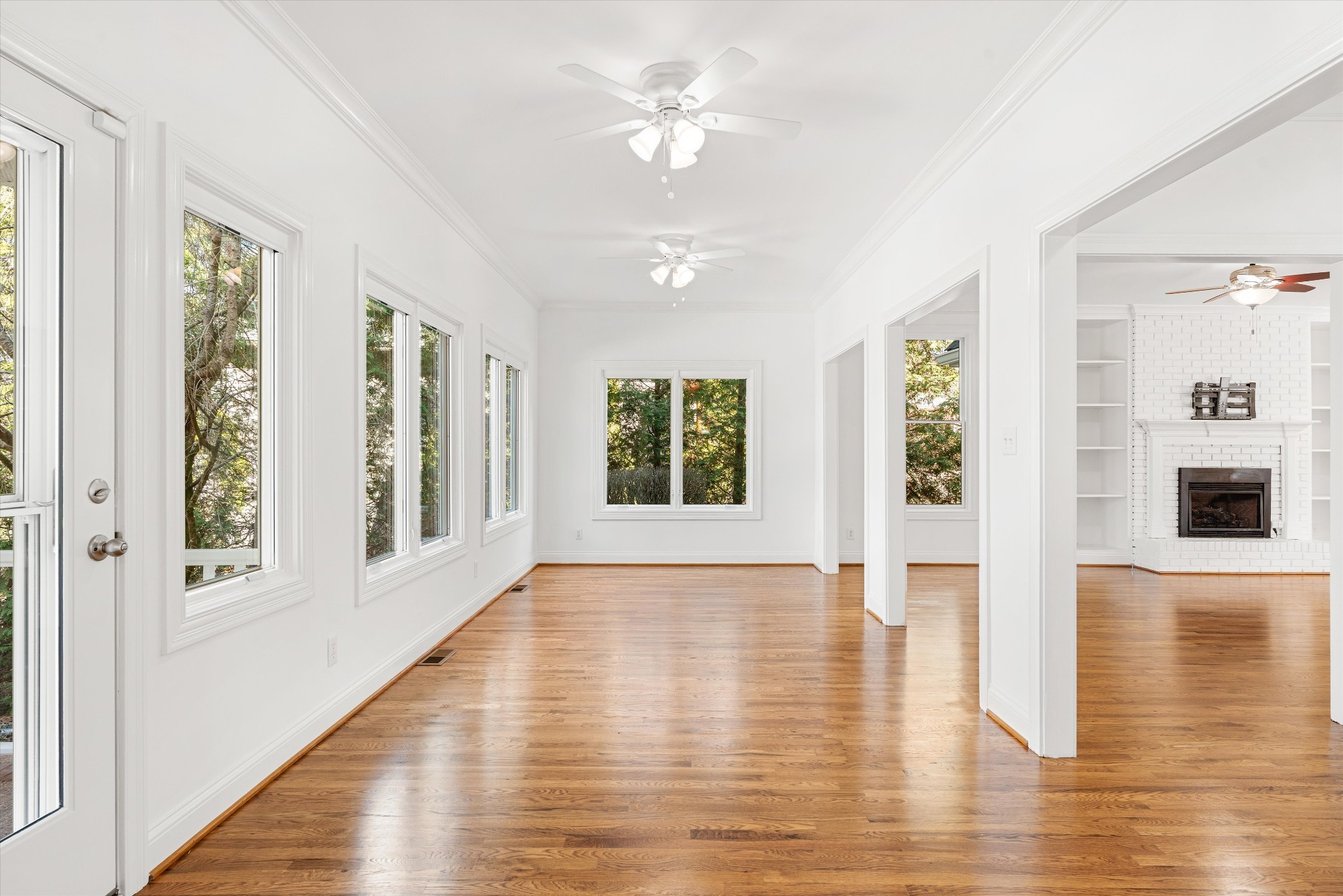 3863 Saundersville Ferry Road Mount Juliet, TN 37122 - Photo 21 of 83 a view of an empty room with window and wooden floor