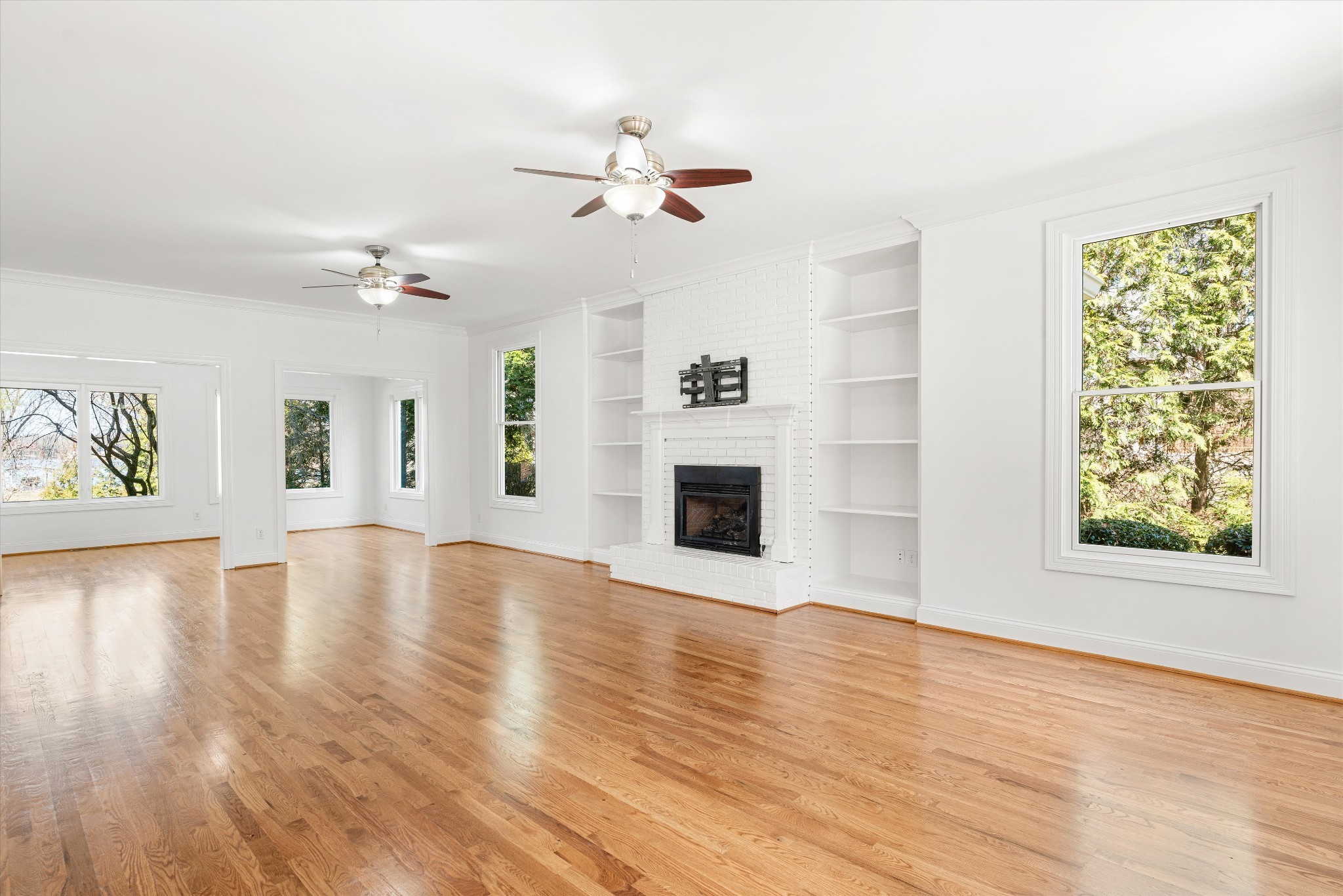 3863 Saundersville Ferry Road Mount Juliet, TN 37122 - Photo 24 of 83 a view of an empty room with window and wooden floor