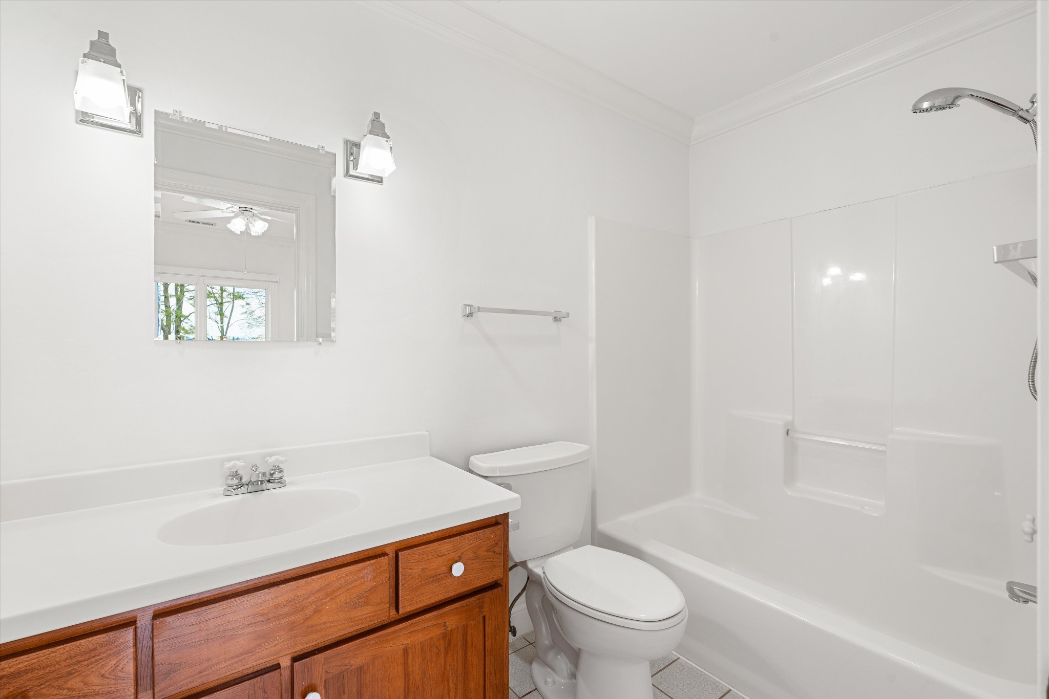 3863 Saundersville Ferry Road Mount Juliet, TN 37122 - Photo 49 of 83 a bathroom with a sink a toilet and a bathtub