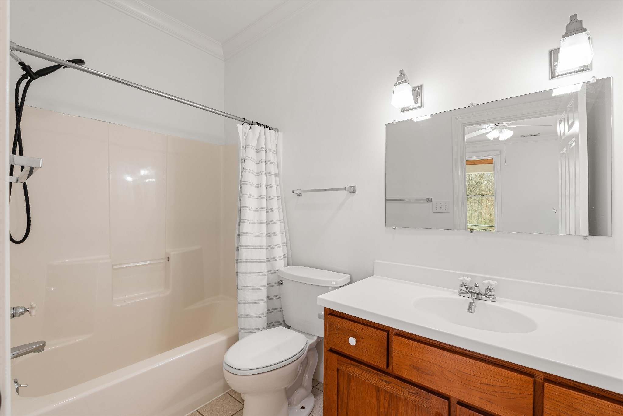 3863 Saundersville Ferry Road Mount Juliet, TN 37122 - Photo 50 of 83 a bathroom with a sink a toilet and shower
