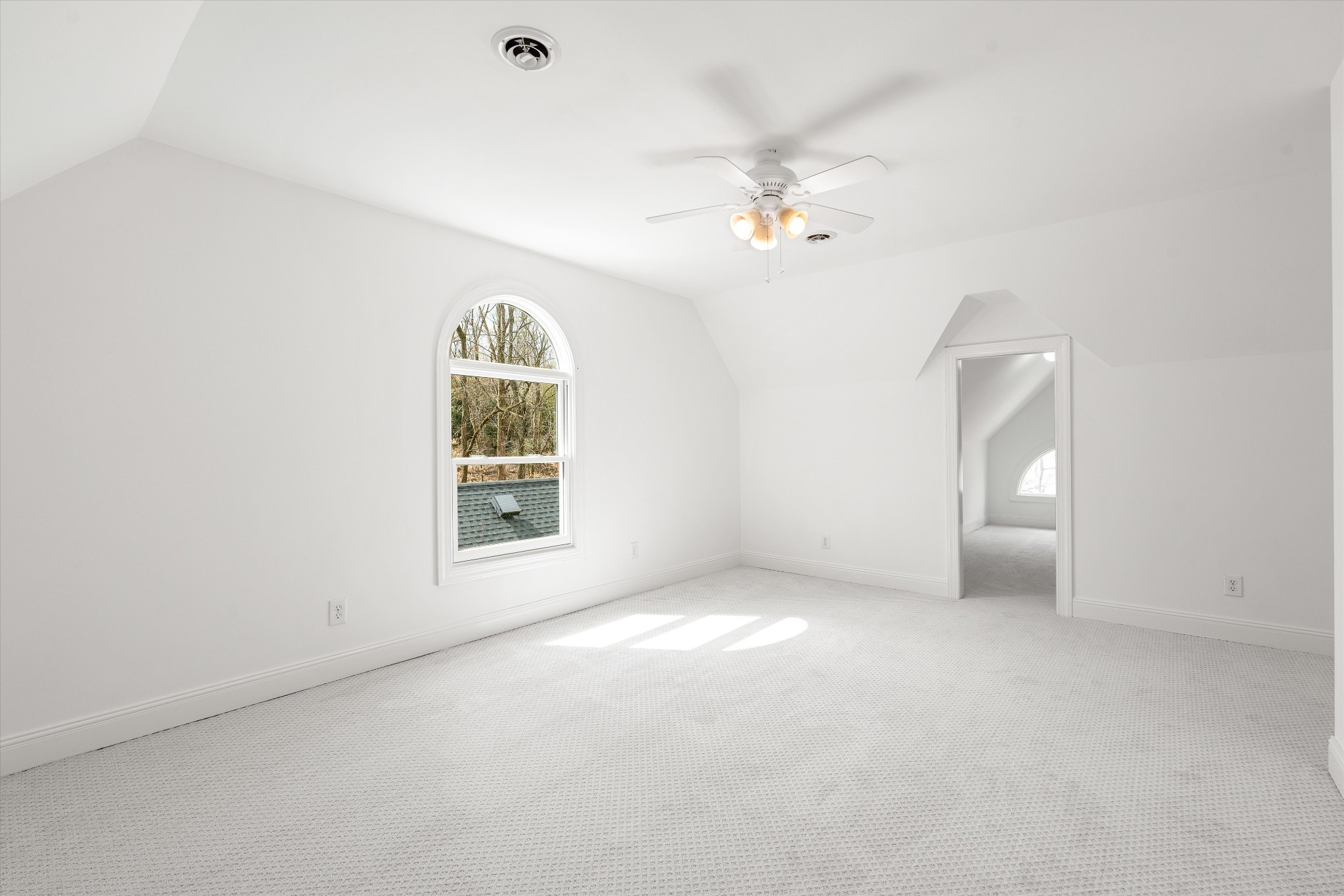 3863 Saundersville Ferry Road Mount Juliet, TN 37122 - Photo 53 of 83 an empty room with a window and a ceiling fan