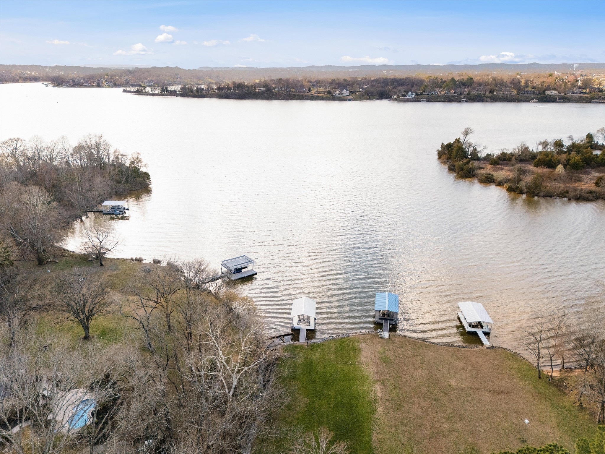 3863 Saundersville Ferry Road Mount Juliet, TN 37122 - Photo 72 of 83 a view of a lake and mountain in the back