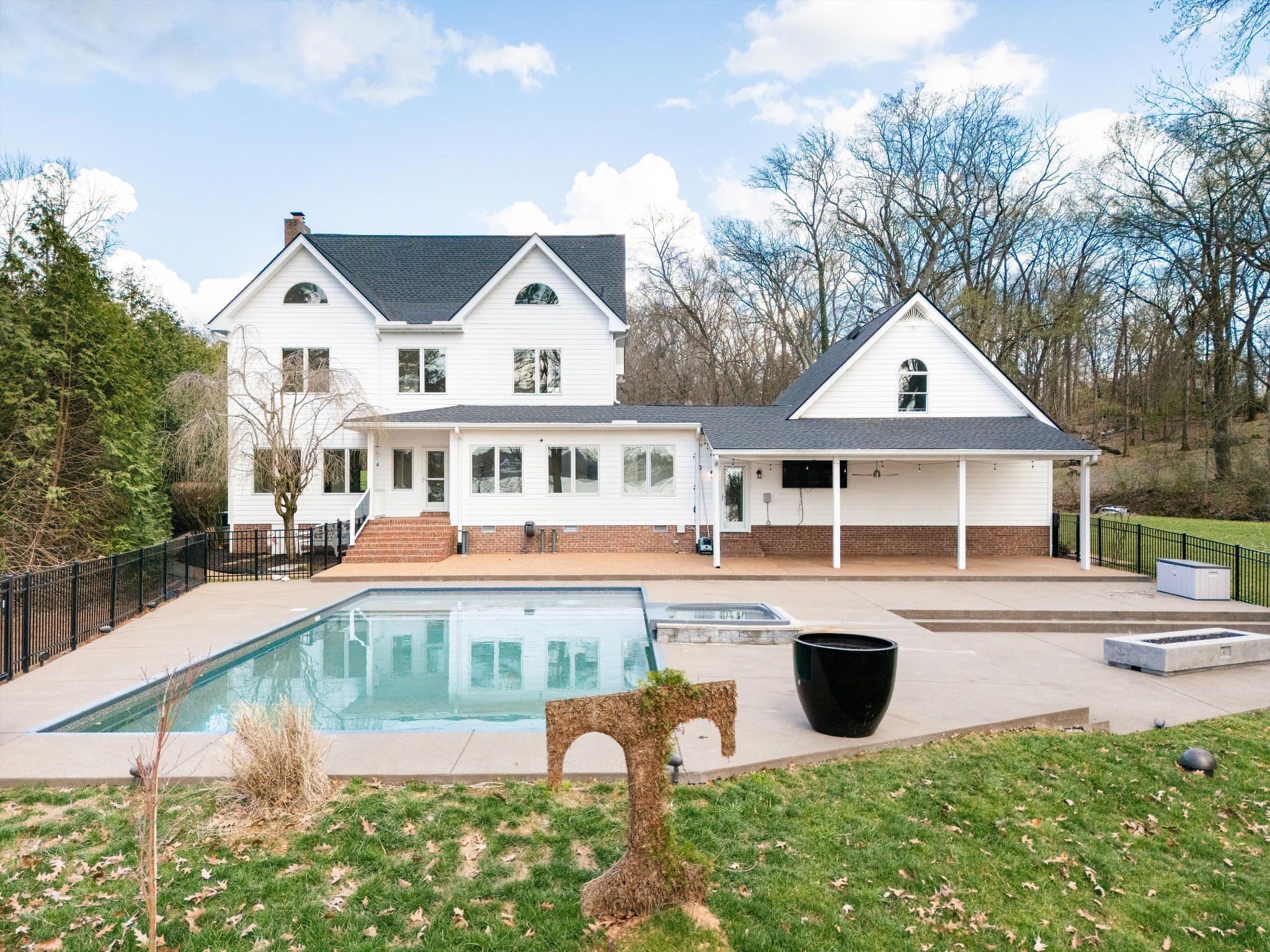3863 Saundersville Ferry Road Mount Juliet, TN 37122 - Photo 77 of 83 a front view of a house with swimming pool