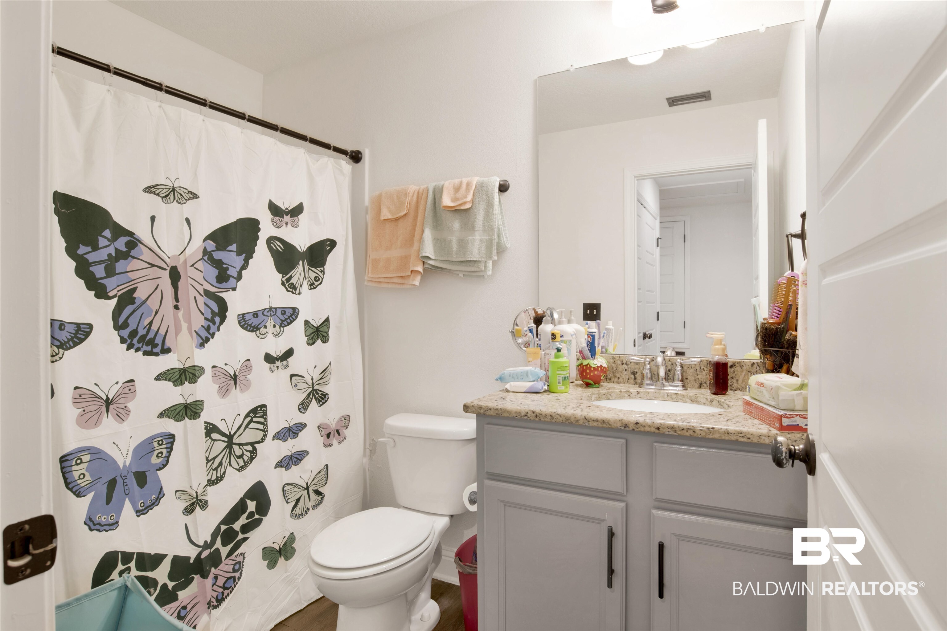 25806 Pollard Road, Unit 80 Daphne, AL 36526 - Photo 7 of 30 Full bath with a shower with curtain and vanity