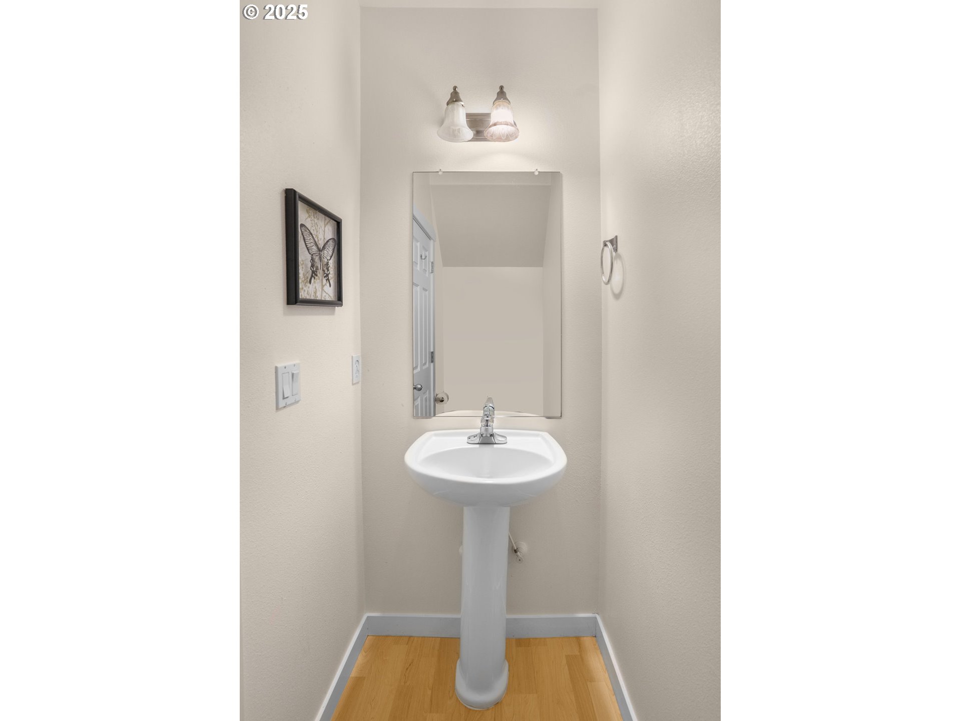 515 Northeast Suttle Street Portland, OR 97211 - Photo 12 of 28 a bathroom with a sink and a mirror