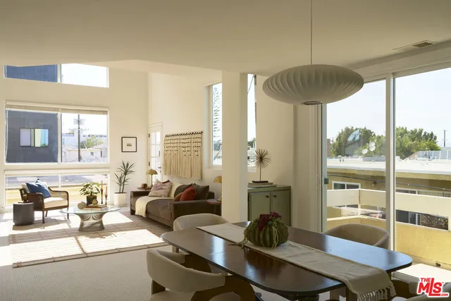 a room with furniture and a chandelier