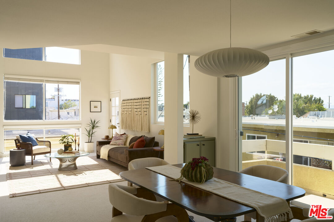 a room with furniture and a chandelier