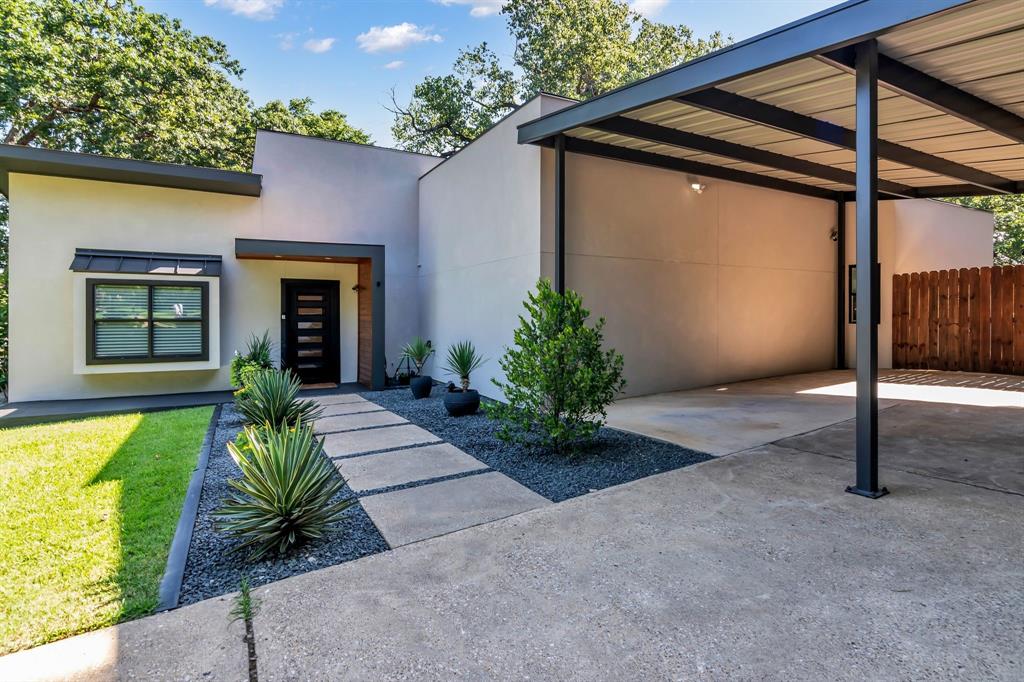 3449 West T Parr Road Grapevine, TX 76051 - Photo 5 of 32 a house view with a garden space