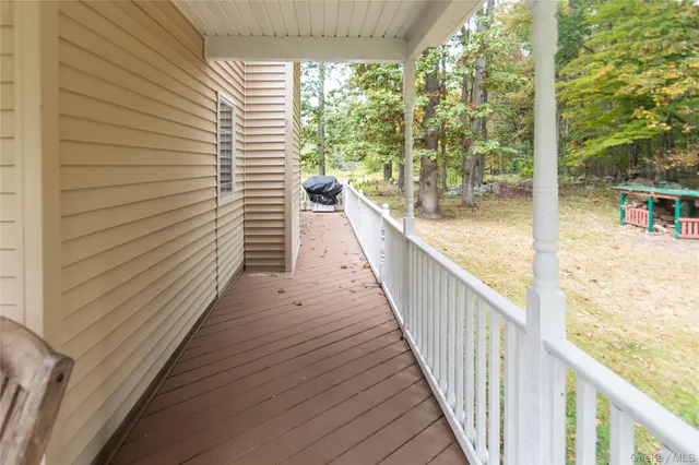 a view of balcony and yard