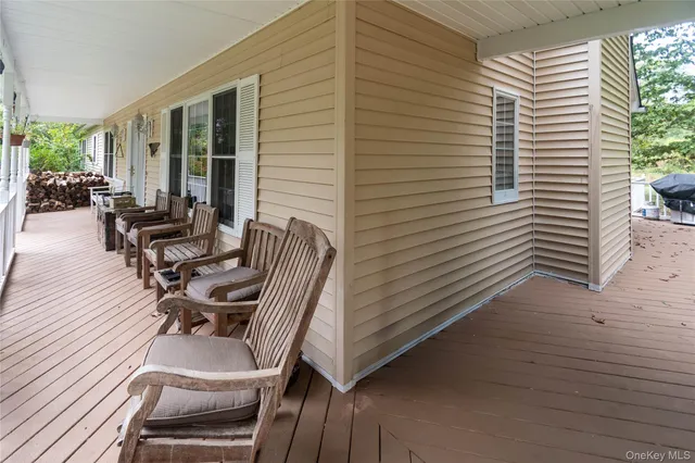 a view of a patio with chairs