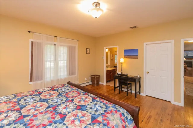 a bathroom with a tub and a sink