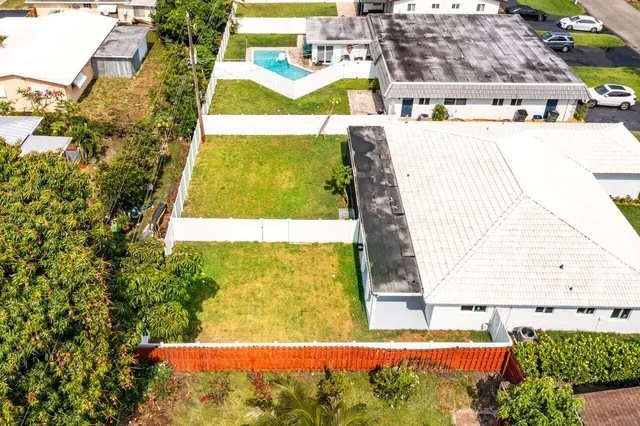 a view of swimming pool with a yard
