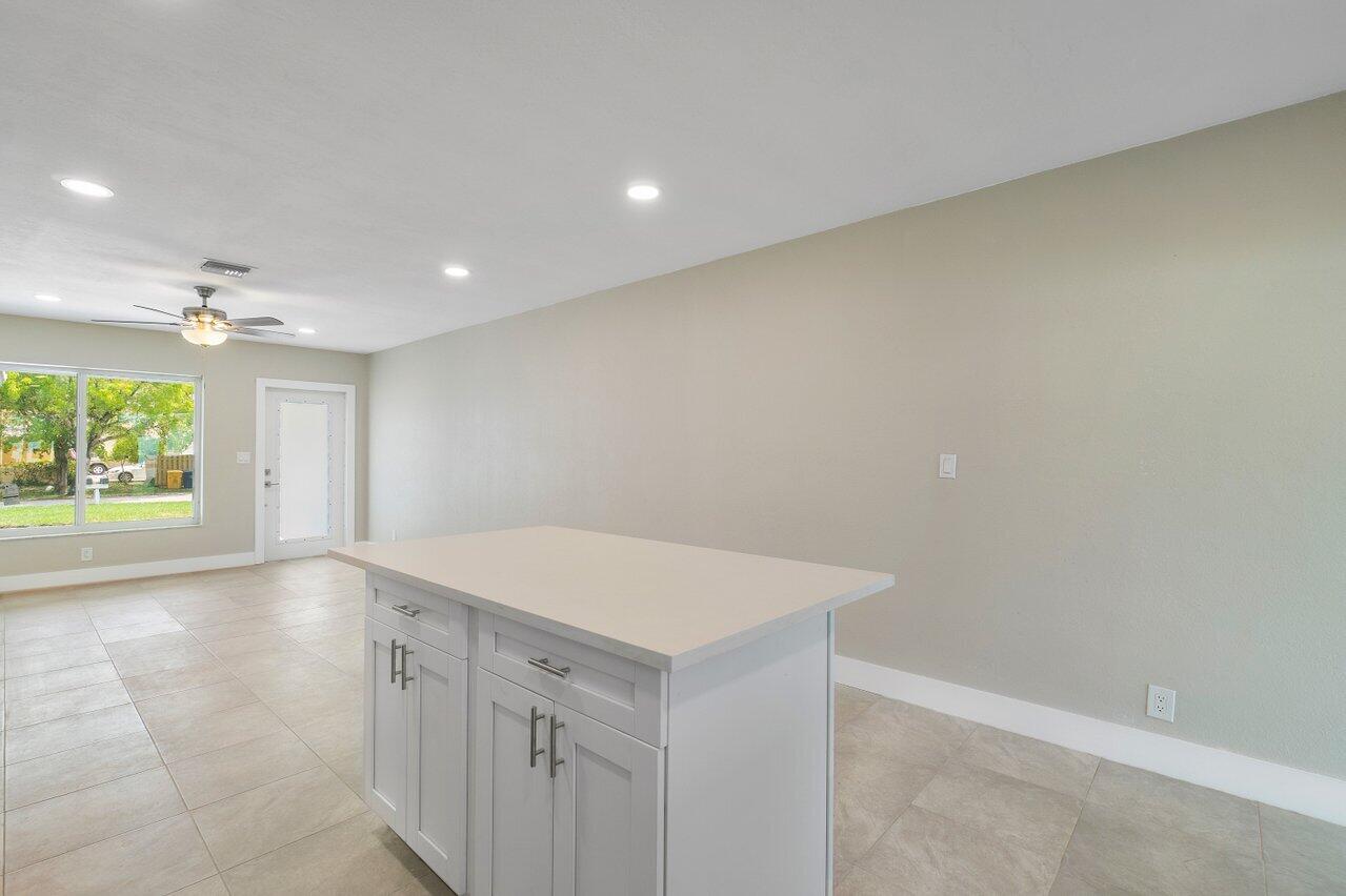 245 Southwest 6th Street Boca Raton, FL 33432 - Photo 9 of 40 an empty room with windows