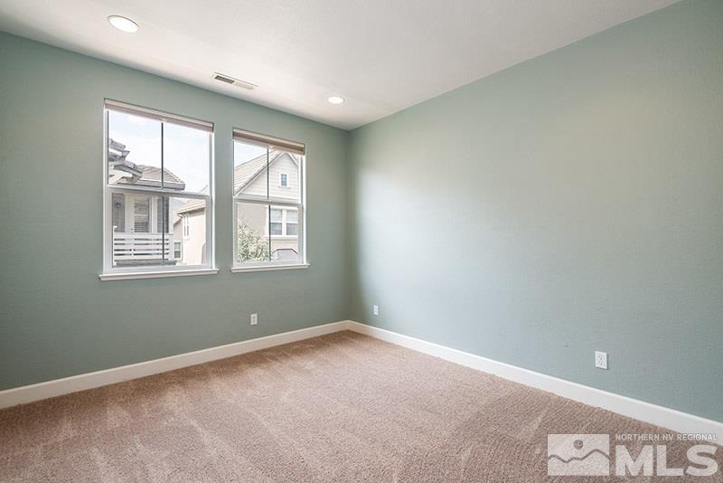 7677 Stone Bluff Way Reno, NV 89523 - Photo 12 of 17 an empty room with a window