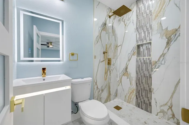 a view of a storage & utility room with two washing machine