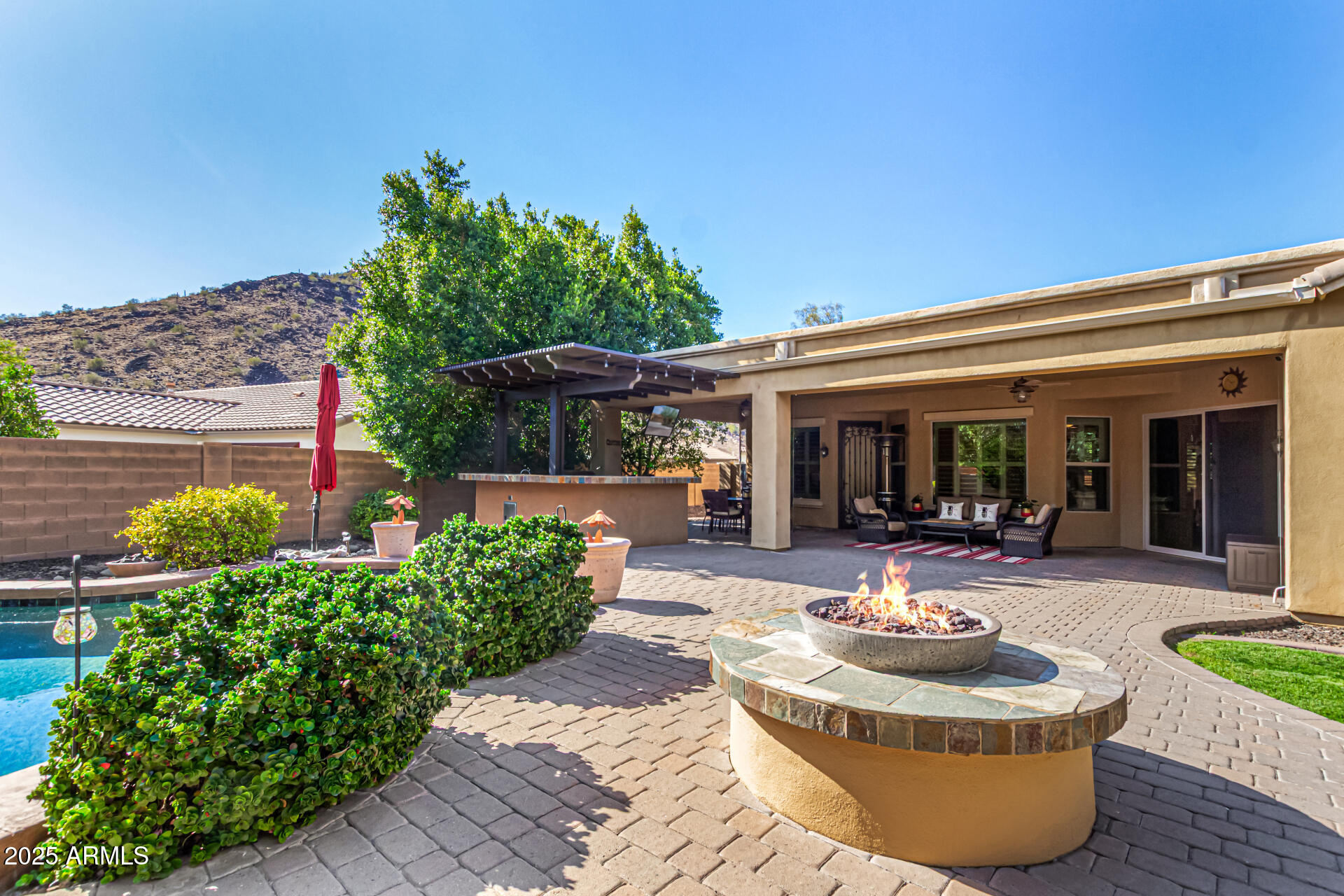 5523 West Yearling Road Phoenix, AZ 85083 - Photo 10 of 54 a view of a house with outdoor seating area
