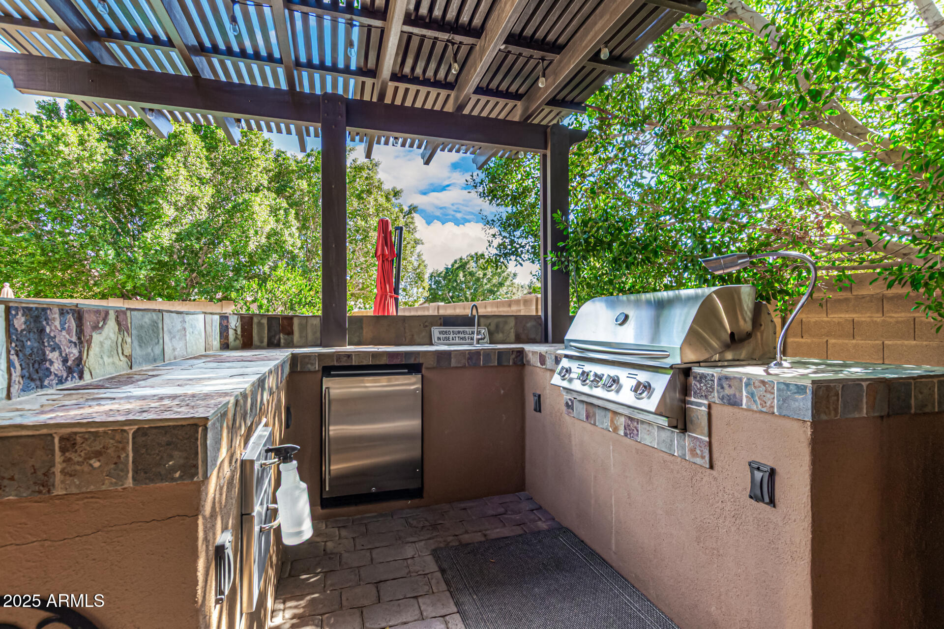 5523 West Yearling Road Phoenix, AZ 85083 - Photo 12 of 54 a kitchen with a stove and a refrigerator