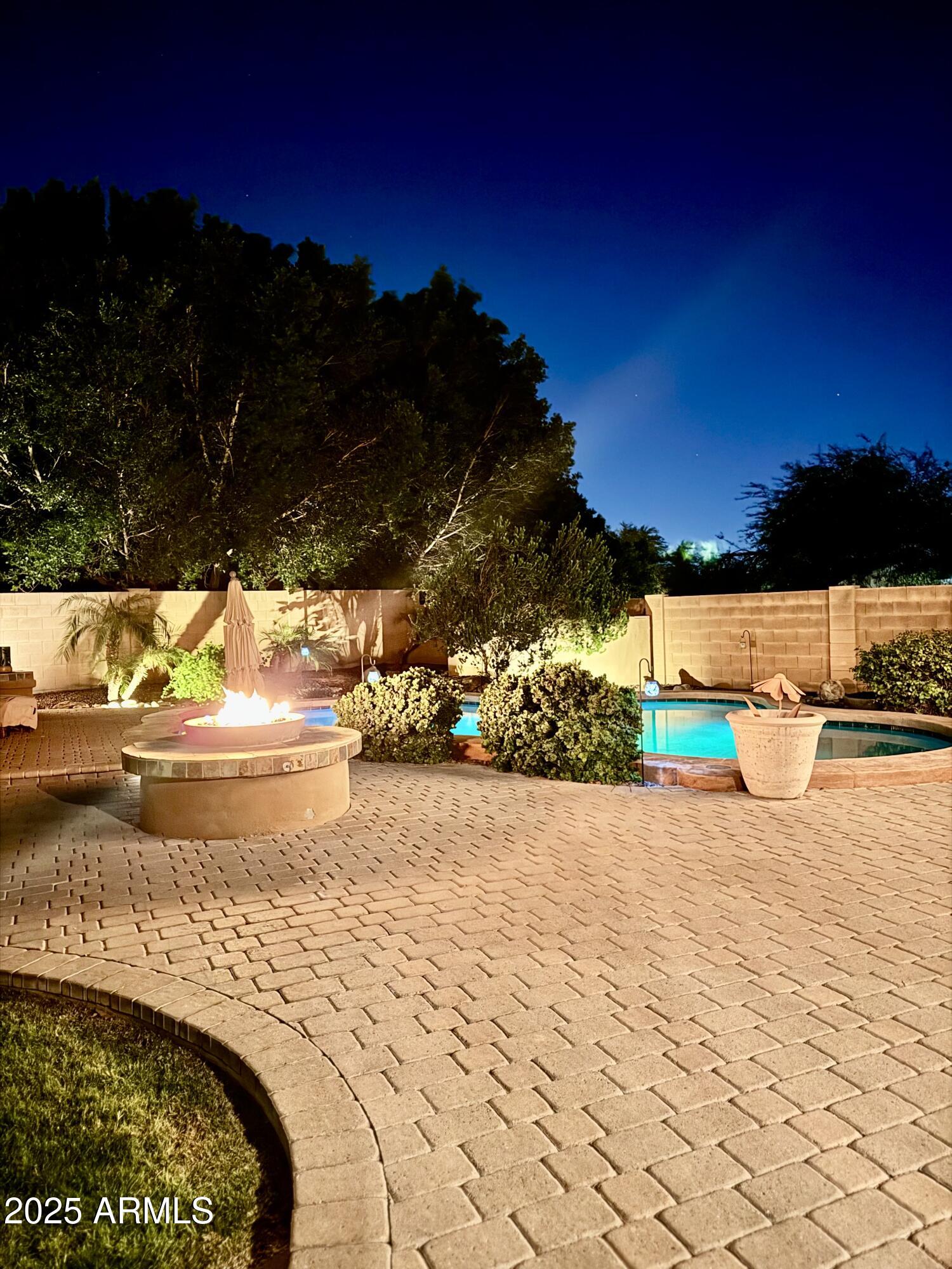 5523 West Yearling Road Phoenix, AZ 85083 - Photo 16 of 54 a view of a swimming pool with an outdoor space