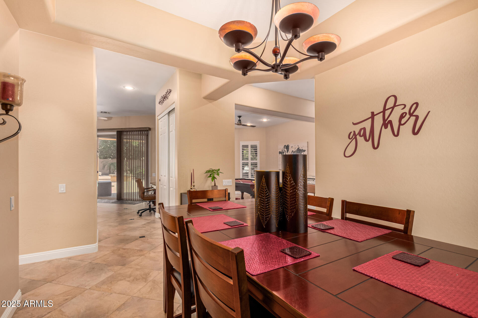 5523 West Yearling Road Phoenix, AZ 85083 - Photo 28 of 54 a view of a dining room with furniture and chandelier