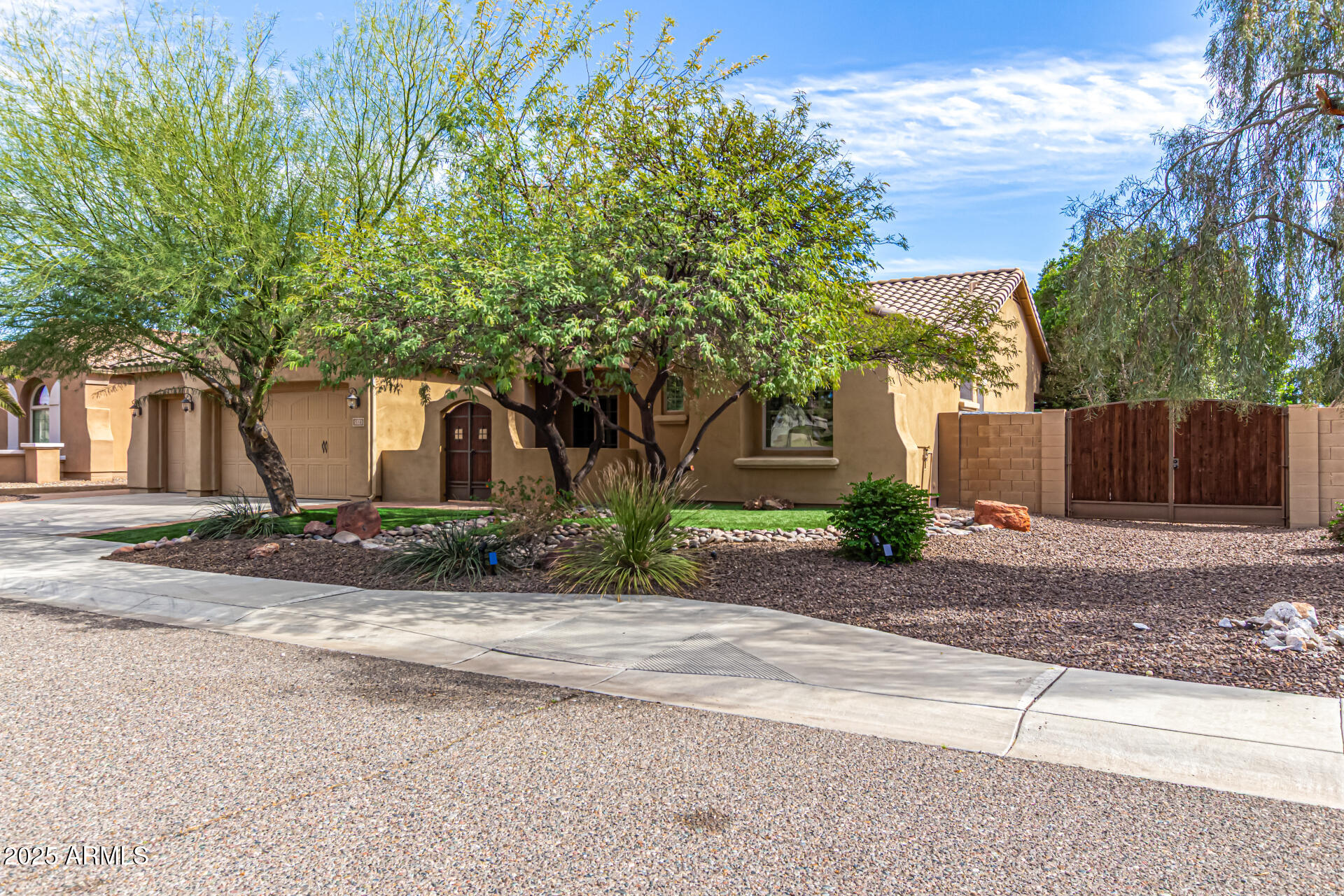 5523 West Yearling Road Phoenix, AZ 85083 - Photo 4 of 54 a view of a house with a yard and large tree