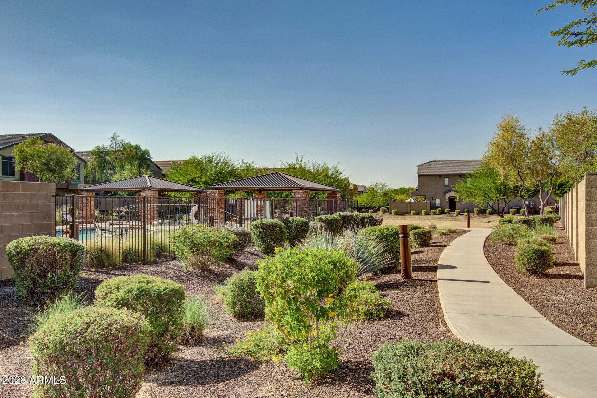 2725 East Mine Creek Road, Unit 1101 Phoenix, AZ 85024 - Photo 35 of 43 a view of a garden with patio