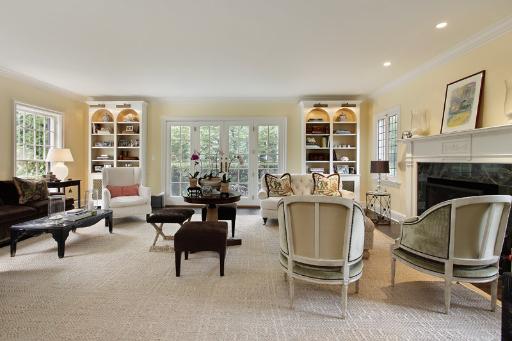 1162 Tower Road Winnetka, IL 60093 - Photo 3 of 13 a living room with furniture a window and a fireplace