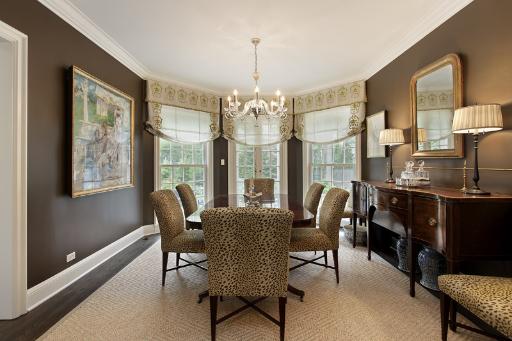 1162 Tower Road Winnetka, IL 60093 - Photo 4 of 13 a view of a dining room with furniture window and outside view